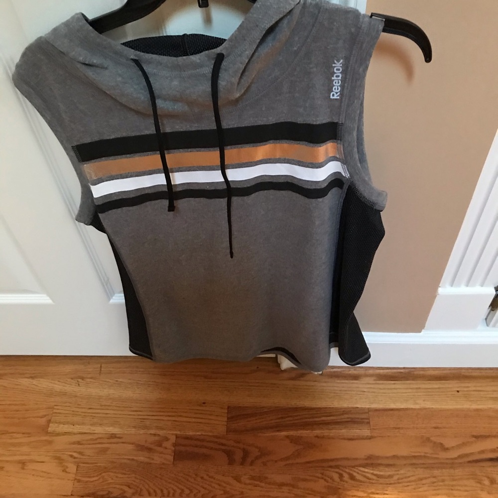 Pullover sports vest with hoodie.